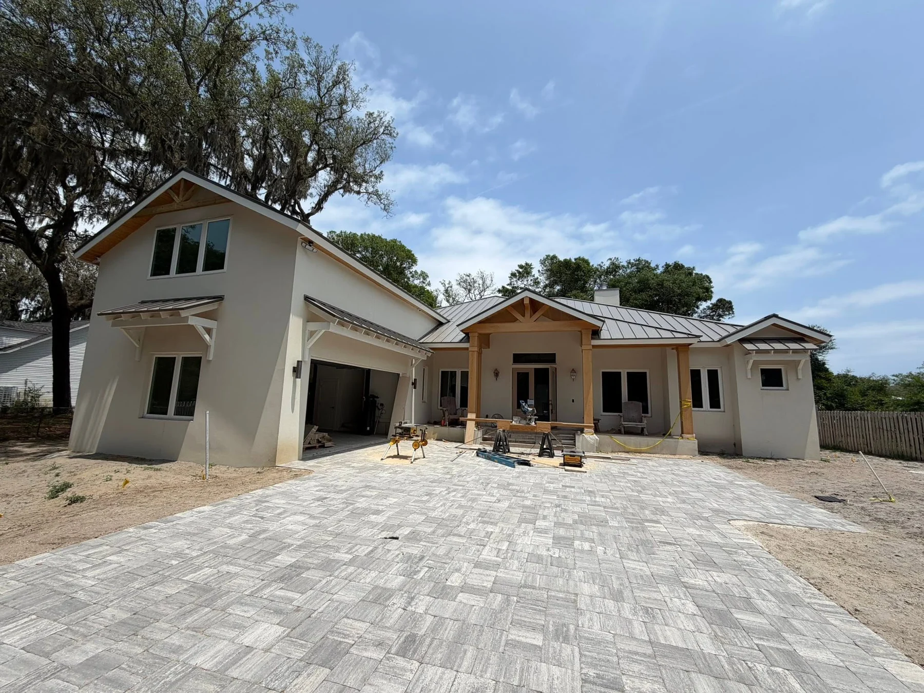 Large Northeast Florida home during exterior finish and porch detail work
